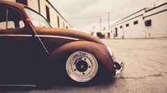 Volkswagen volkswagen beetle rust vehicle wheels outdoors sepia