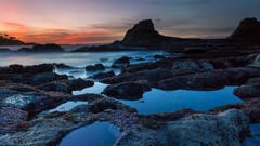 water mist rock sunset