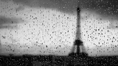 water on glass Eiffel Tower blurred monochrome rain Paris France