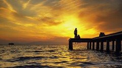 water sunlight sun pier People