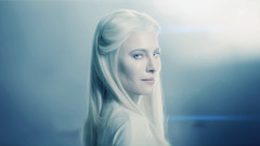 Women looking at viewer face blue background model